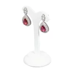earring stand white medium angle view with earring