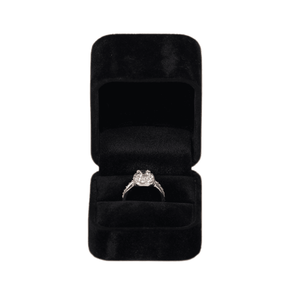 Black velvet ring box with a cushion interior, displaying an engagement ring 1