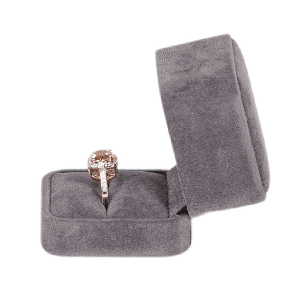 Dark grey velvet ring box with a cushion interior, displaying an engagement ring open1