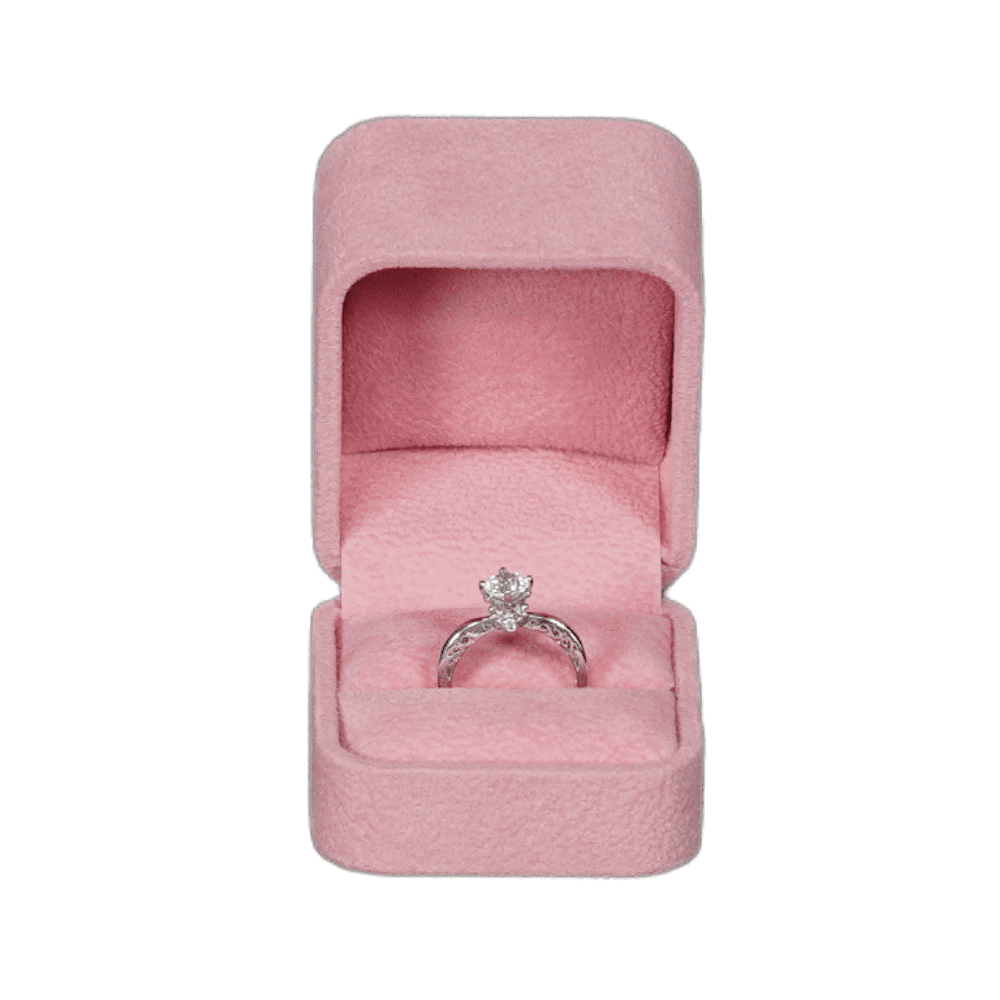 ring-box-velvet-pink-BXR82-4 Pink velvet ring box with a cushion interior, displaying an engagement ring. top