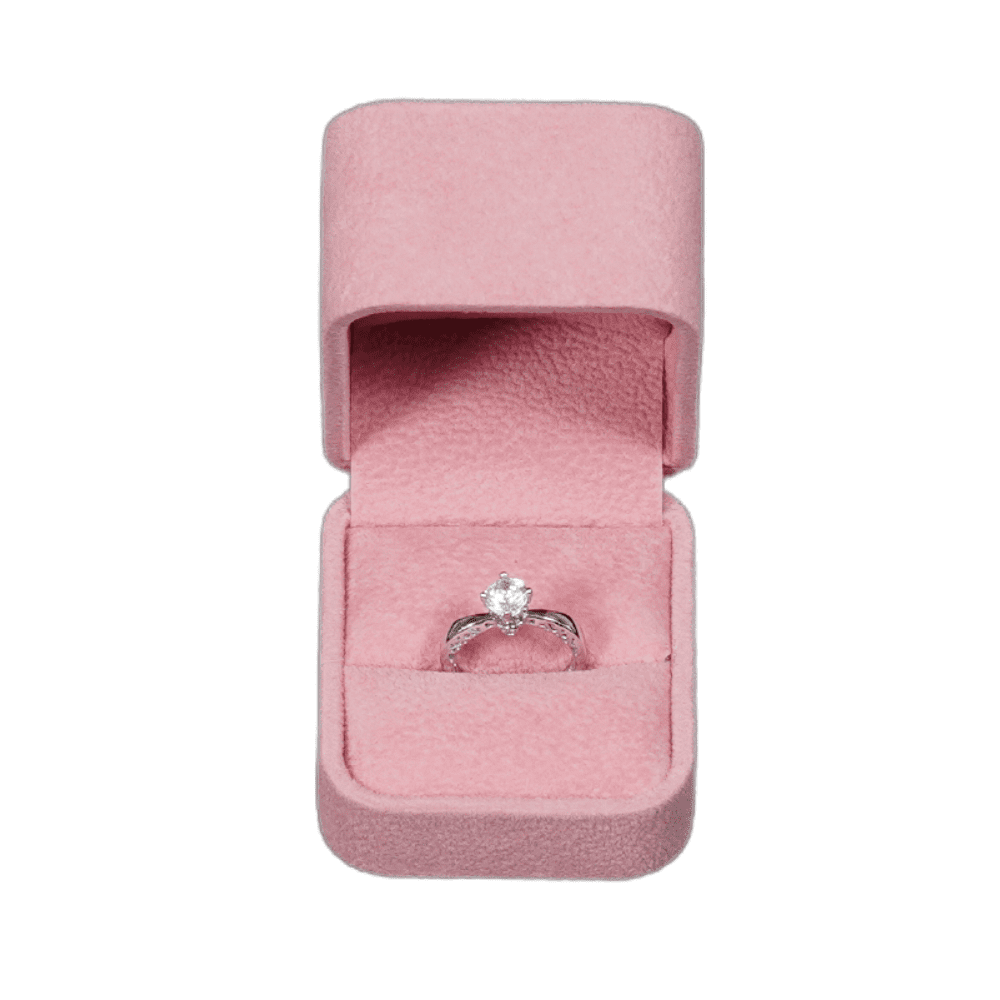ring-box-velvet-pink-BXR82-6 Pink velvet ring box with a cushion interior, displaying an engagement ring. top