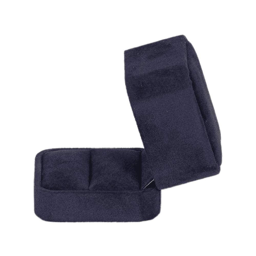 Royal blue velvet ring box with a cushion interior side