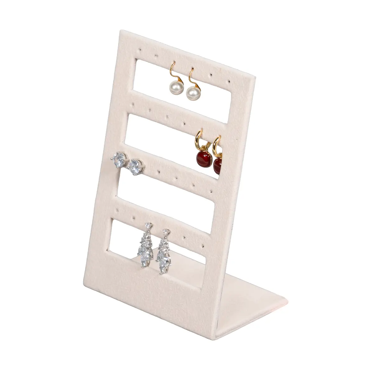 stud earring stand small beige angle view with earring