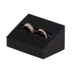 wedding ring holder black angle view with ring