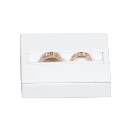 wedding ring holder white front view with ring